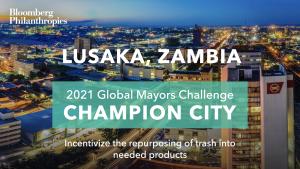 Photo of Lusaka’s skyline. A green box signifies the city as a 2021 Global Mayors Challenge Champion City with a brief description that reads: "Giving mismanaged waste new life and value”