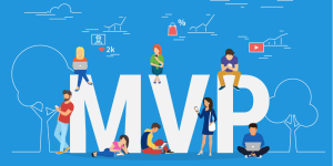 Light blue background. In the middle of the image, there are bold white letters that read "MVP" for minimum viable product. On top of any around the letters are people working on their digital devices.