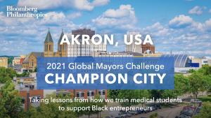 Photo of Akron's skyline. A blue box signifies the city as a 2021 Global Mayors Challenge Champion City with a brief description that reads: "Sparking a vibrant ecosystem of Black-owned businesses"