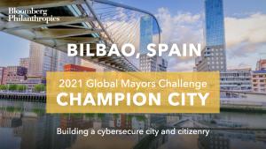 Photo Bilbao’s skyline. A yellow box signifies the city as a 2021 Global Mayors Challenge Champion City with a brief description that reads: "Building a cybersecure city and citizenry"