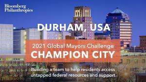 Photo of Durham’s skyline. An orange box signifies the city as a 2021 Global Mayors Challenge Champion City with a brief description that reads: "Delivering critical supports to marginalized communities”