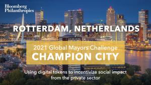 Photo of Rotterdam’s skyline. A yellow box signifies the city as a 2021 Global Mayors Challenge Champion City with a brief description that reads: "Incentivizing social impact in the private sector”