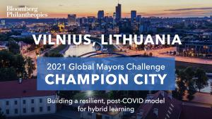 Photo of Vilniusa’ skyline. A blue box signifies the city as a 2021 Global Mayors Challenge Champion City with a brief description that reads: “Building a lasting model for hybrid learning”