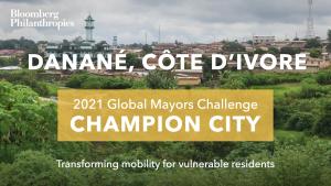 Photo of Danané’s skyline. A yellow box signifies the city as a 2021 Global Mayors Challenge Champion City with a brief description that reads: "Transforming mobility for vulnerable residents”