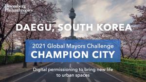 Photo of Daegu’s skyline. A blue box signifies the city as a 2021 Global Mayors Challenge Champion City with a brief description that reads: "Bringing new life to urban spaces”