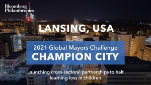 Photo of Lansing’s skyline. A blue box signifies the city as a 2021 Global Mayors Challenge Champion City with a brief description that reads: "Partnering to halt learning loss in children”