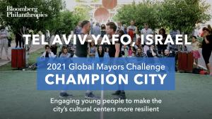 Photo of people watching a performance in Tel Aviv-Yafo. A blue box signifies the city as a 2021 Global Mayors Challenge Champion City with a brief description that reads: "Engaging young people to make the city’s cultural centers more resilient”
