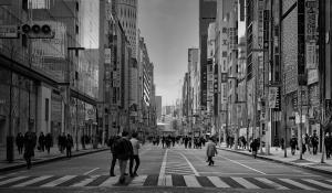 A busy streetscape in black and white