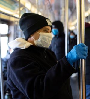 Person on subway with mask