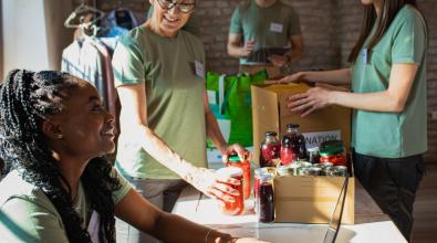 city workers collaborating at local charity event