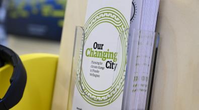 A pamphlet reading "our changing city".