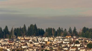 Suburban homes in Beaverton, Oregon, in late afternoon.