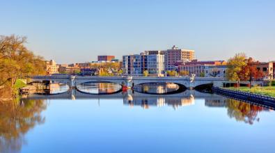 A view of the South Bend, Indiana skyline as seen over the river.